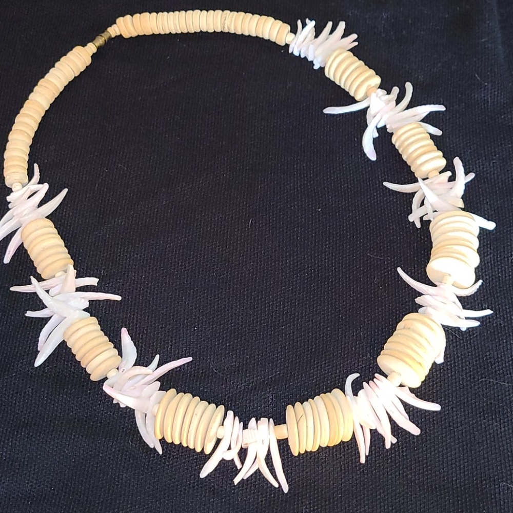 Unique beaded cream necklace